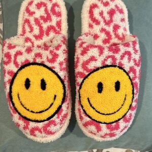 Slippers with emoji logo